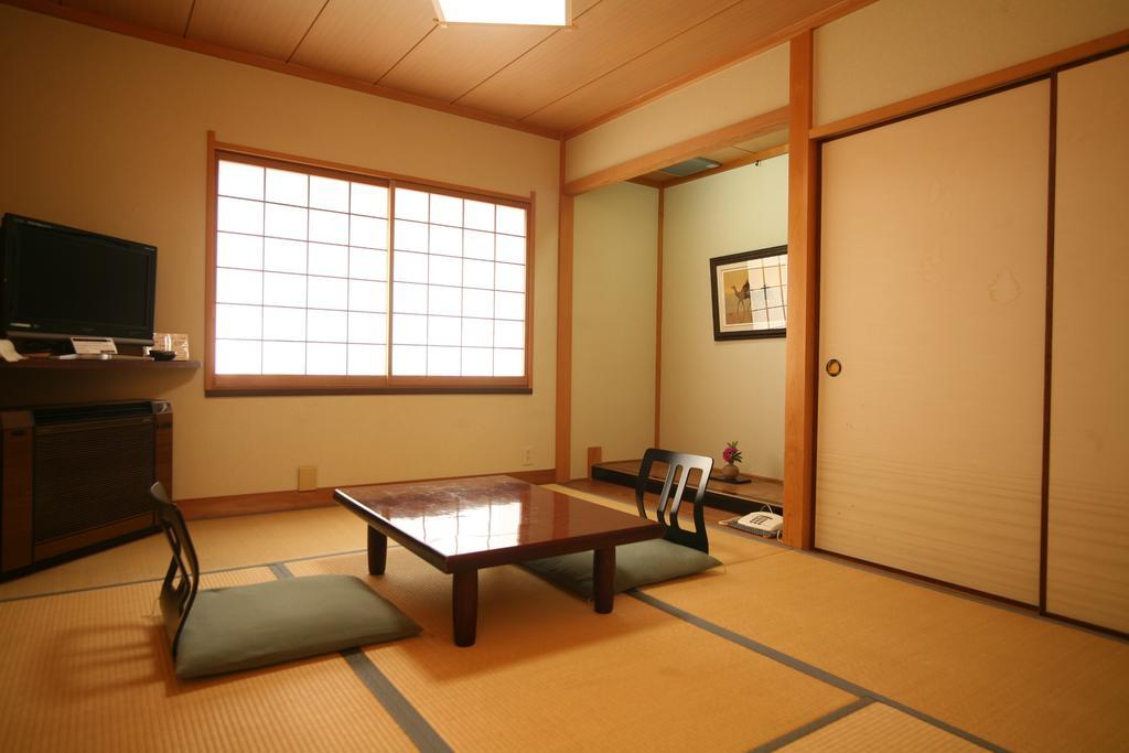 Kinosaki Onsen Kawaguchiya Honkan Тоёока Номер фото